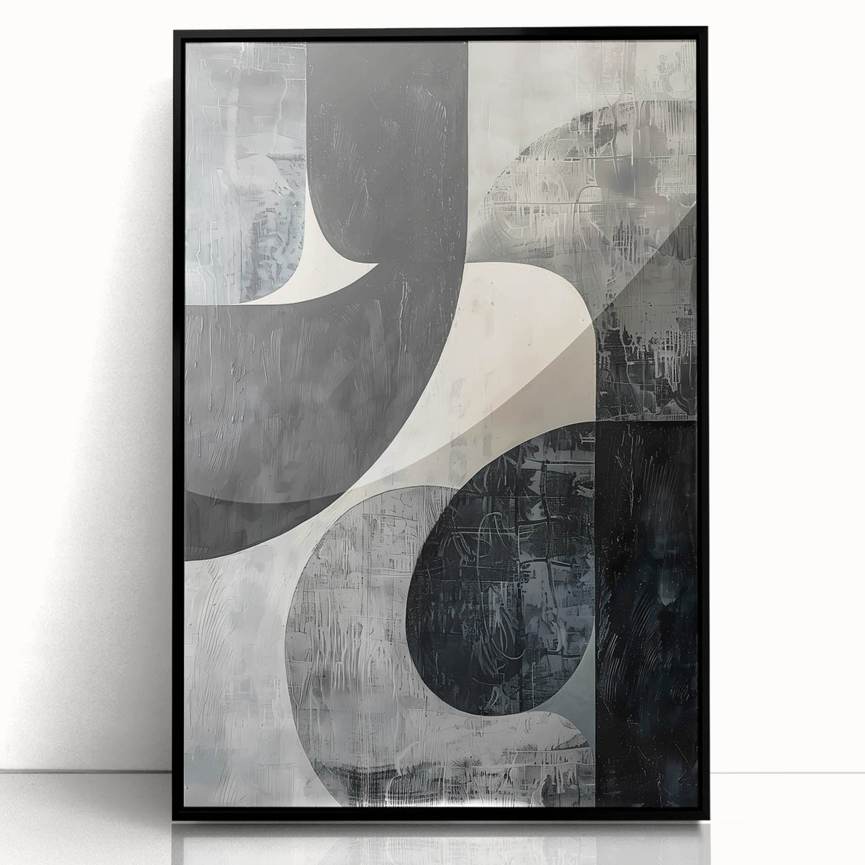 Framed minimalist wall art showcasing an abstract design with soft black and white tones, perfect for modern decor, displayed against a bright backdrop.
