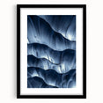 Framed black landscape cave artwork with a white mat, showcasing intricate details and textures, perfect for modern home decor or art enthusiasts.