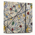 Abstract acrylic glass art piece featuring vibrant splatters in an array of colors, displayed side view with decorative pins. Ideal for modern decor and art enthusiasts.
