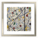 Abstract silver-framed art print showcasing colorful splatter designs within a mat, ideal for modern decor. Perfect for adding a vibrant touch to living spaces.