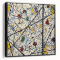 Framed canvas artwork displaying an abstract splatter design in black, showcasing a sleek side view that highlights its modern aesthetic and textured finish, perfect for contemporary home decor.