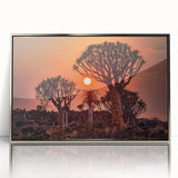 Acrylic print of an abstract African landscape in muted earth tones, framed in silver, suitable for modern art wall decor.