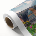 Art deco poster of an Albanian landscape on rolled canvas, featuring soft pastel shades, ideal for nursery wall art.