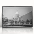 Large abstract wall art depicting a Parisian scene in muted gray and blue tones on a framed acrylic.