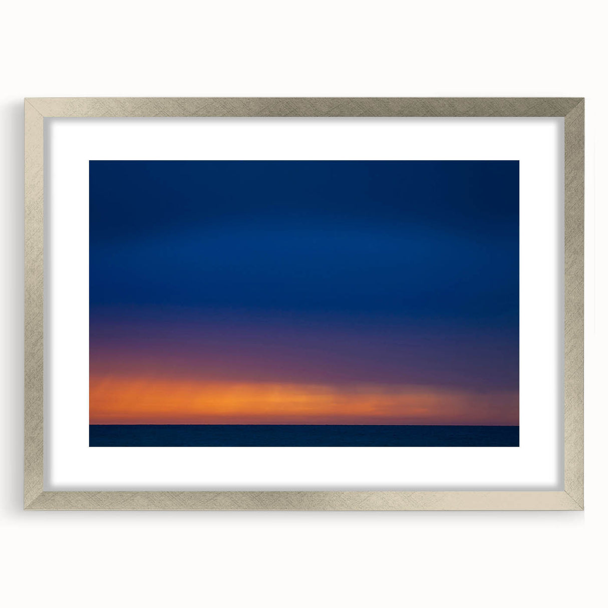 Textured abstract art print of Yucatan scenery in a silver frame, featuring earthy and green tones.