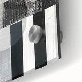 Close-up of abstract minimalist wall art featuring vibrant colors and geometric designs, set against a sleek acrylic glass background, adding a modern touch to any interior decor.