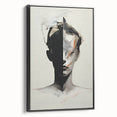 Framed minimalist wall art piece showcasing an abstract design in black tones, displayed in a sleek side view, perfect for modern home decor.
