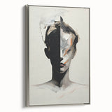 Framed canvas wall art showcasing an abstract minimalist design in silver tones, displayed in a modern setting, emphasizing elegance and sophistication.