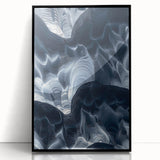 Framed acrylic artwork showcasing a stunning landscape scene featuring intricate cave formations, displayed with a sleek black frame for a contemporary look.