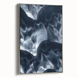 Framed canvas artwork showcasing a stunning landscape of caves, featuring silver edges, ideal for enhancing home decor with a modern touch.