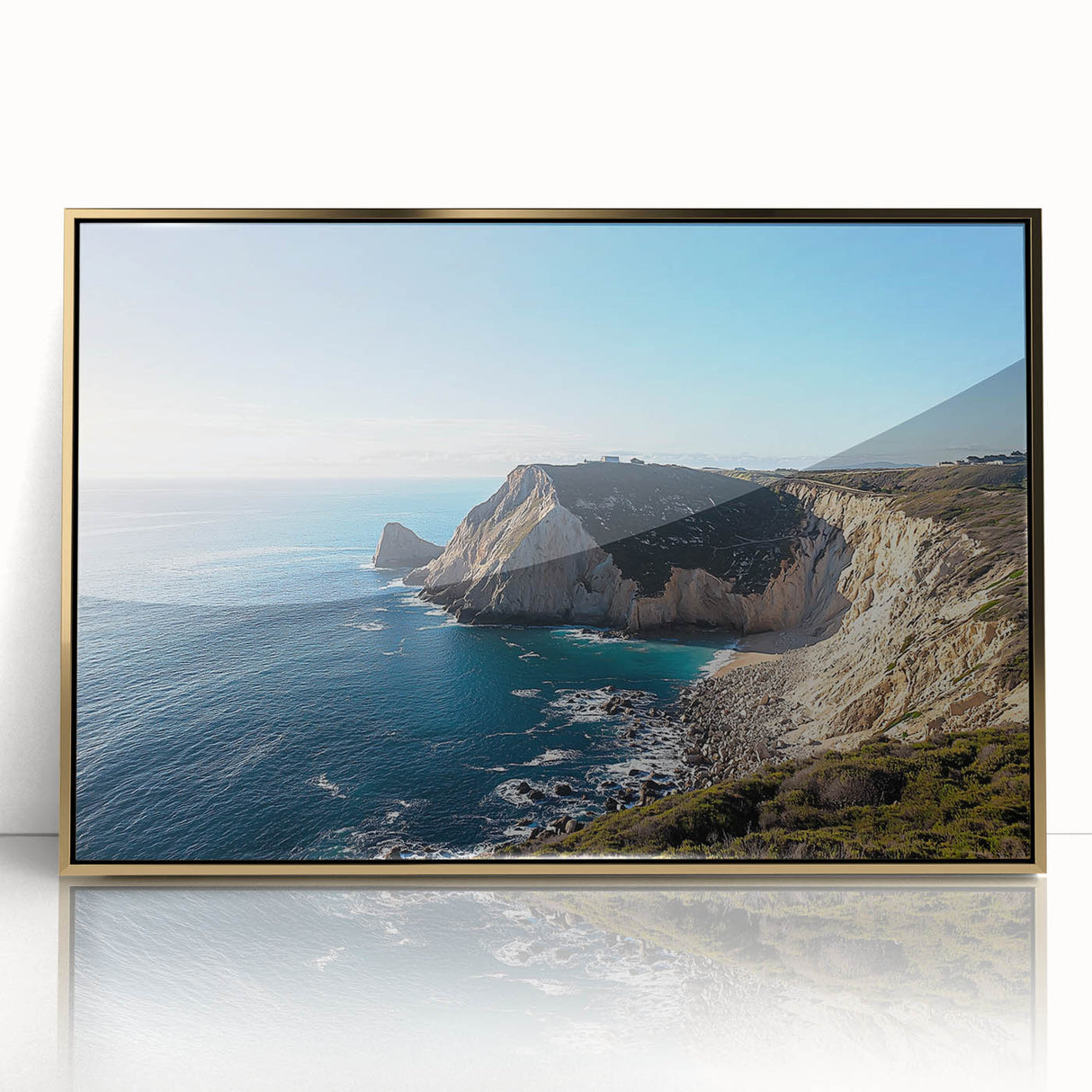 Framed acrylic artwork depicting a stunning cliff landscape with rich gold accents, perfect for modern home decor and adding elegance to any space.