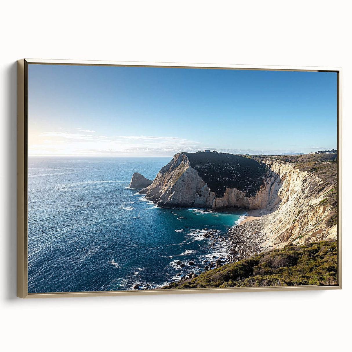 Framed canvas artwork depicting a scenic landscape of majestic cliffs with a gold side view, perfect for adding elegance to home decor.