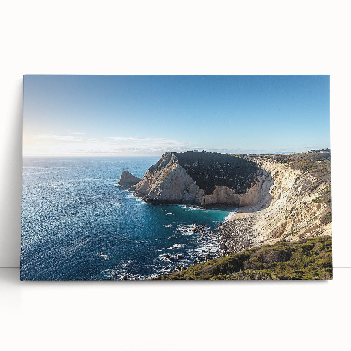 Stretched canvas artwork depicting a breathtaking landscape of rugged cliffs and vibrant skies, perfect for enhancing modern home decor with natural beauty.