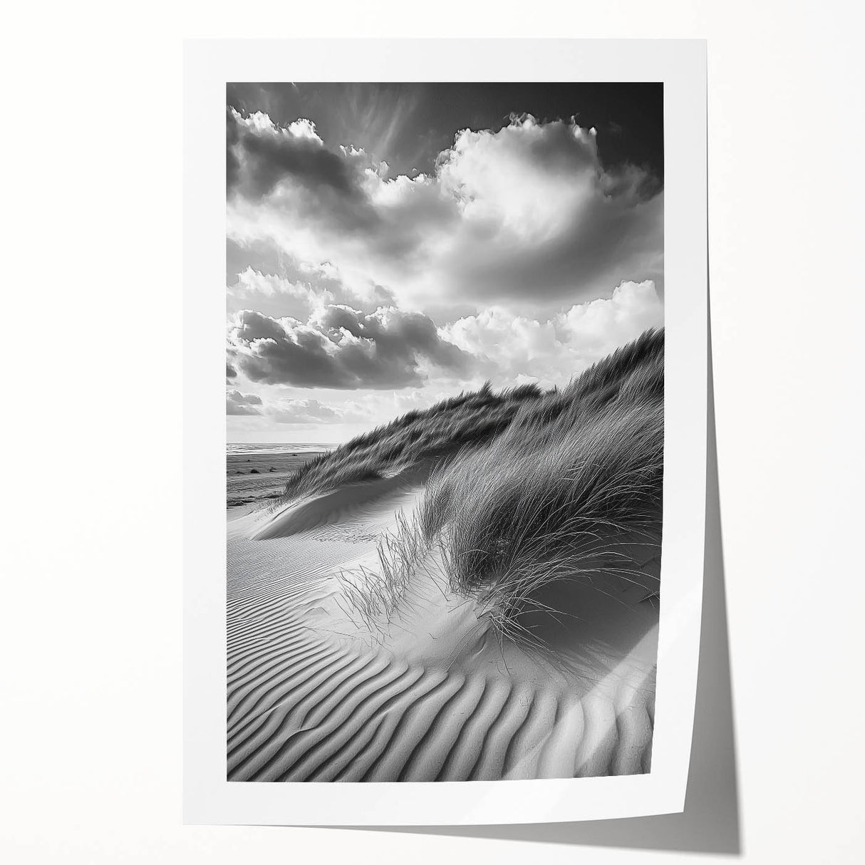 Desert landscape print showcasing golden sand dunes under a clear blue sky, rolled and packaged in a protective cardboard tube for safe shipping.