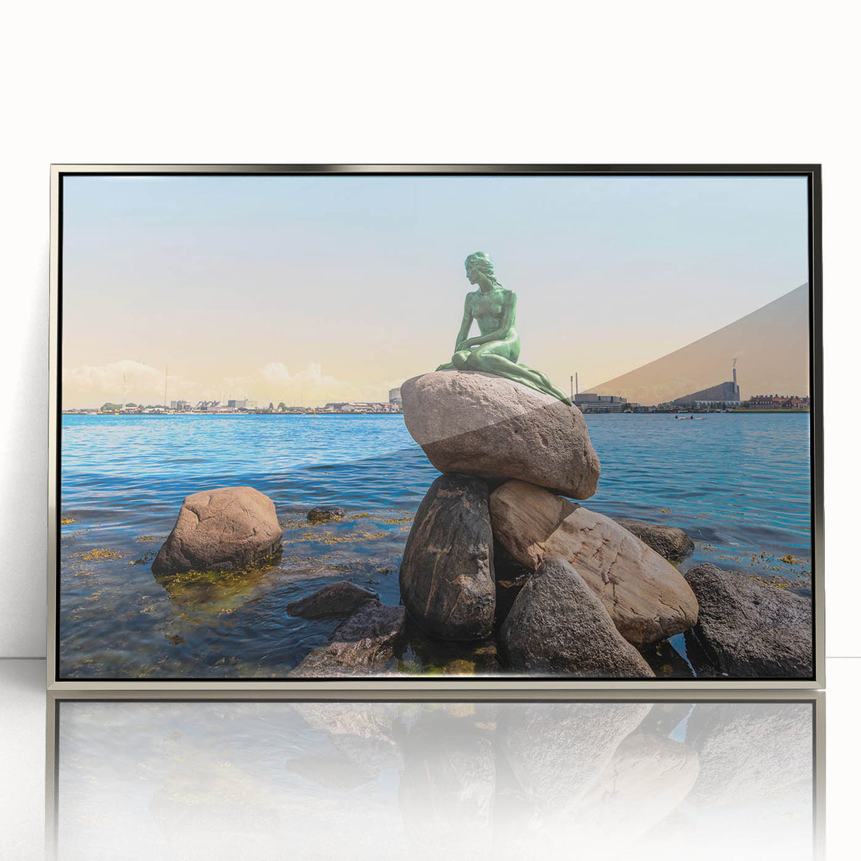 Large art print depicting a mid-century modernist European scenery in muted colors on a silver-framed acrylic.