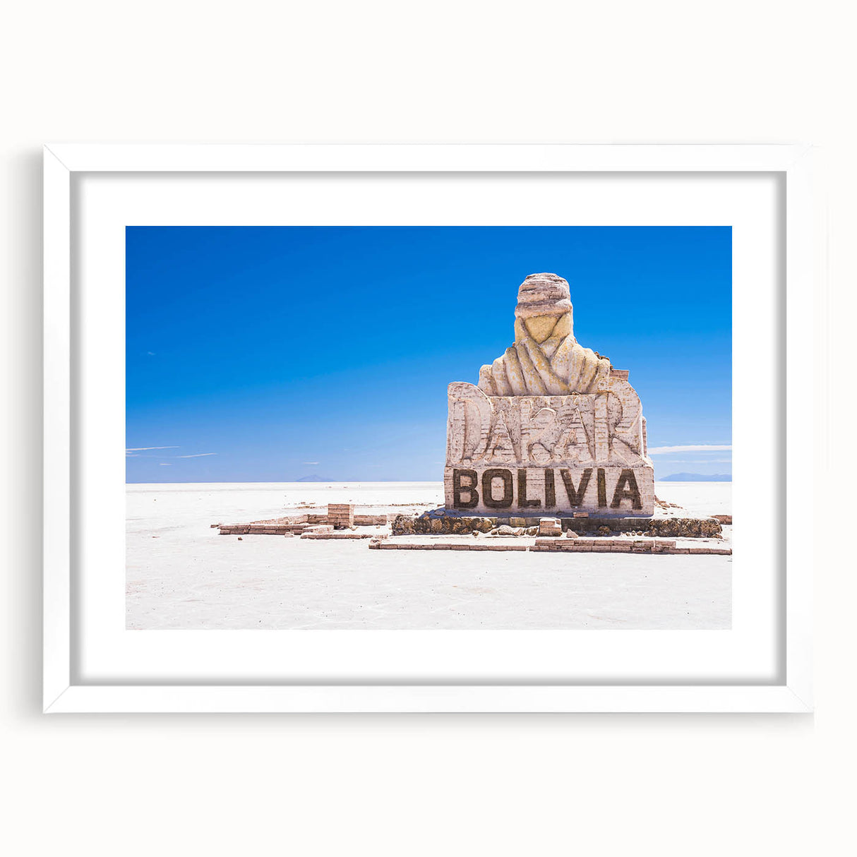 Abstract art print of a Bolivian landscape in muted earth tones on a framed white mat, ideal for dining room decor.