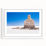 Abstract art print of a Bolivian landscape in muted earth tones on a framed white mat, ideal for dining room decor.