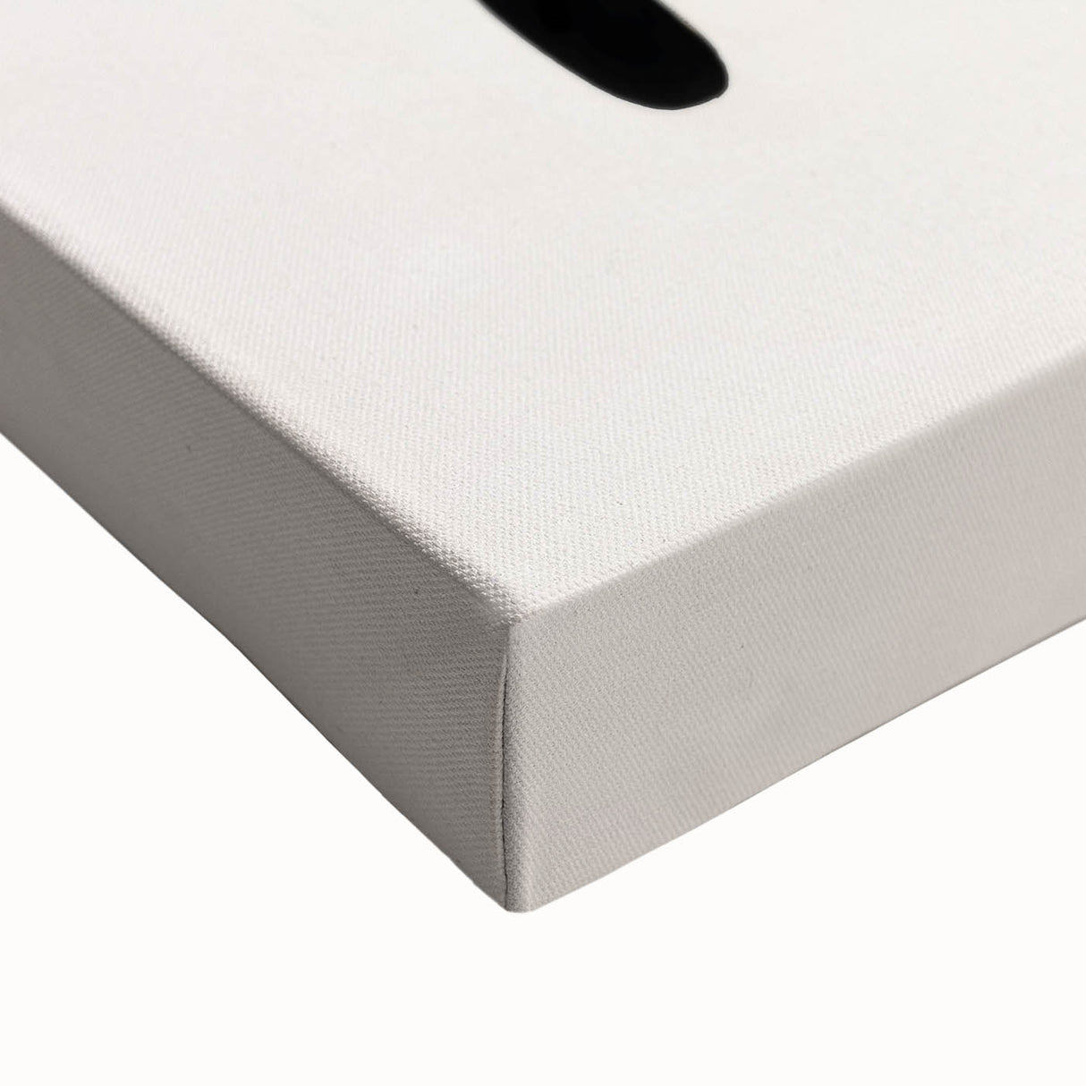 Close-up of a stretched canvas featuring abstract minimalist wall art, showcasing soft pastel colors and geometric shapes, perfect for modern home decor.