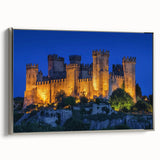 Framed canvas artwork depicting a serene landscape with a castle, featuring a silver frame and a side view that highlights its elegant design, perfect for home decor.