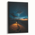 Framed canvas artwork depicting a serene desert landscape with dunes, framed in sleek black, showcasing rich colors and textures that enhance any modern decor.