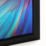 Close-up of textured black wall art featuring multicolored leaves on a framed canvas, suitable for large living room spaces.