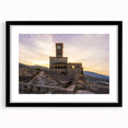 Extra large abstract art print of a colorful European scenery on textured canvas, framed in black.