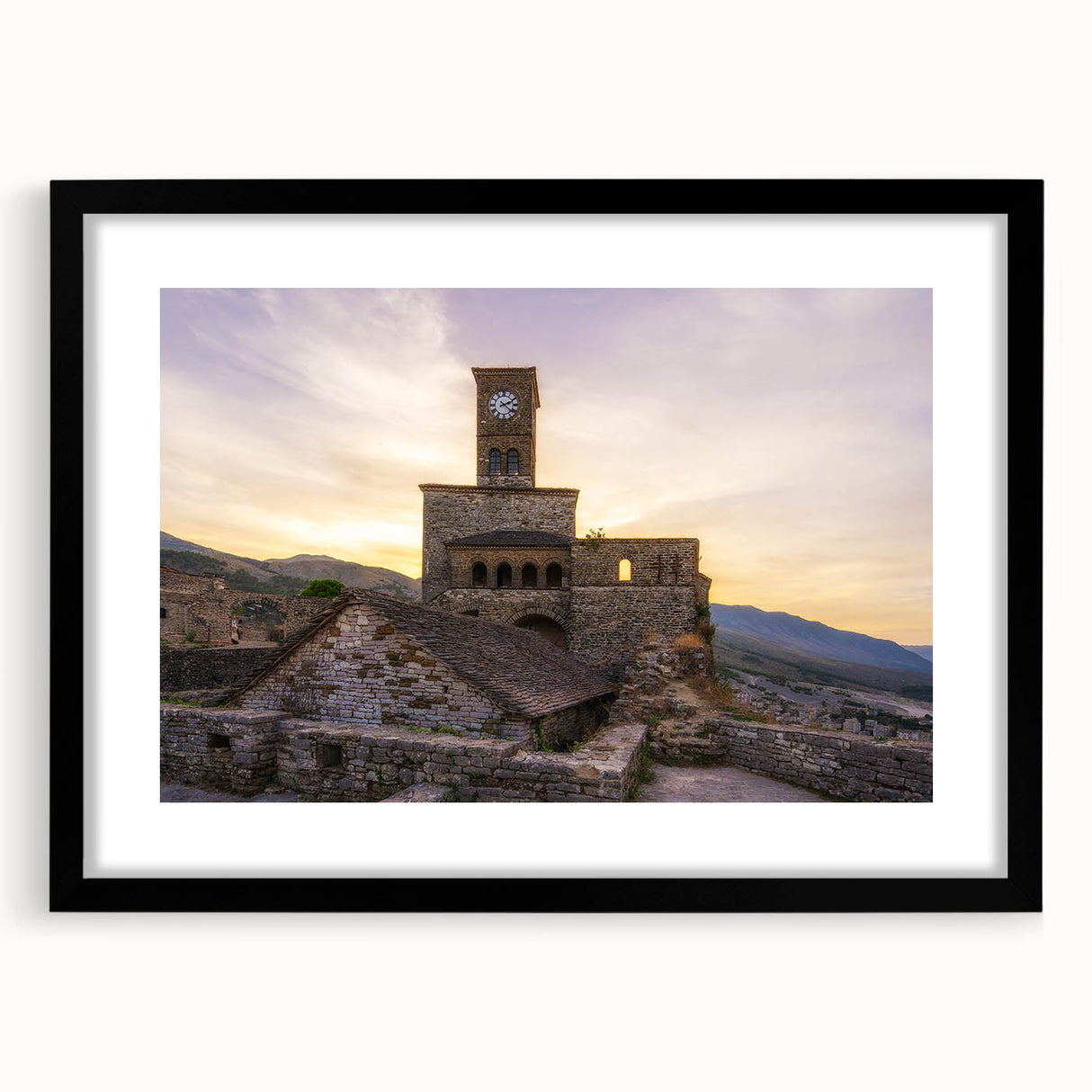 Extra large abstract art print of a colorful European scenery on textured canvas, framed in black.