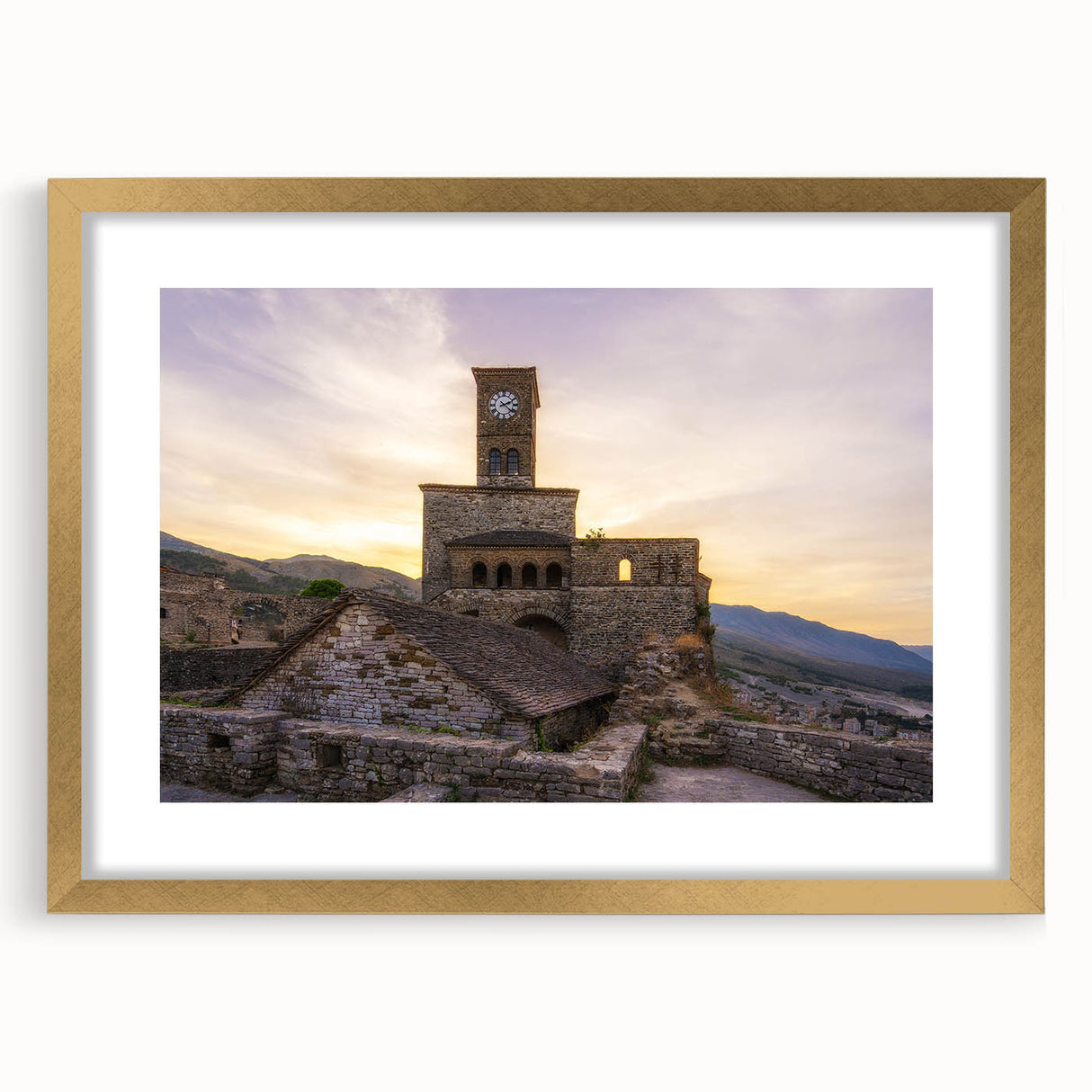 Abstract art print of a European scenery in muted earth tones, framed in gold, suitable for dining room decor.