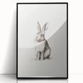 Large abstract wall art depicting winter scene in muted blue and gray tones, framed in black acrylic.