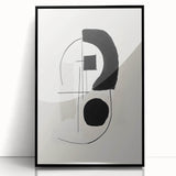 Framed abstract minimalist wall art featuring bold black lines and geometric shapes, elegantly displayed against a light background, perfect for modern decor.
