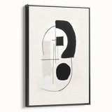 Framed minimalist wall art showcasing an abstract design with black tones, displayed from a side angle to highlight its sleek profile and elegant finish.