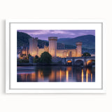 Elegant white-framed landscape artwork depicting a serene castle scene with lush greenery and a blue sky, perfect for home decor or office aesthetics.