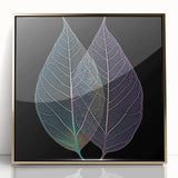 Large art print of close-up leaves in gold frame, featuring mid-century modernist style.