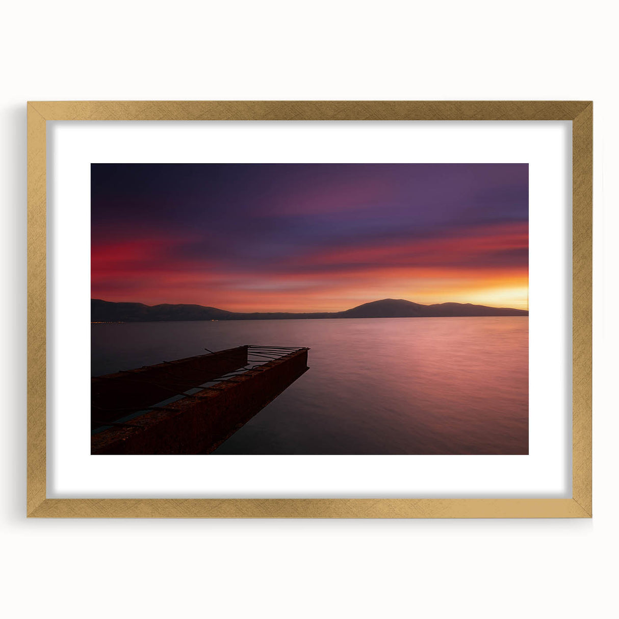 Abstract art print of a European scenery in muted earth tones, framed in gold, ideal for dining room decor.