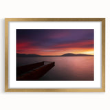 Abstract art print of a European scenery in muted earth tones, framed in gold, ideal for dining room decor.