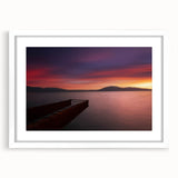 Textured abstract art print depicting a European Albanian scenery in muted earth tones, framed in white.