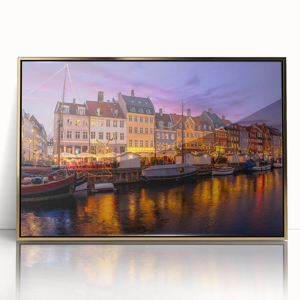 Art Deco style poster of a European scenery in muted gold and blue hues, acrylic framed, ideal for modern nursery decor.