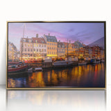 Art Deco style poster of a European scenery in muted gold and blue hues, acrylic framed, ideal for modern nursery decor.