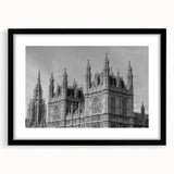 Abstract art print of London scenery in vibrant colors on a textured, extra large canvas, framed in black.