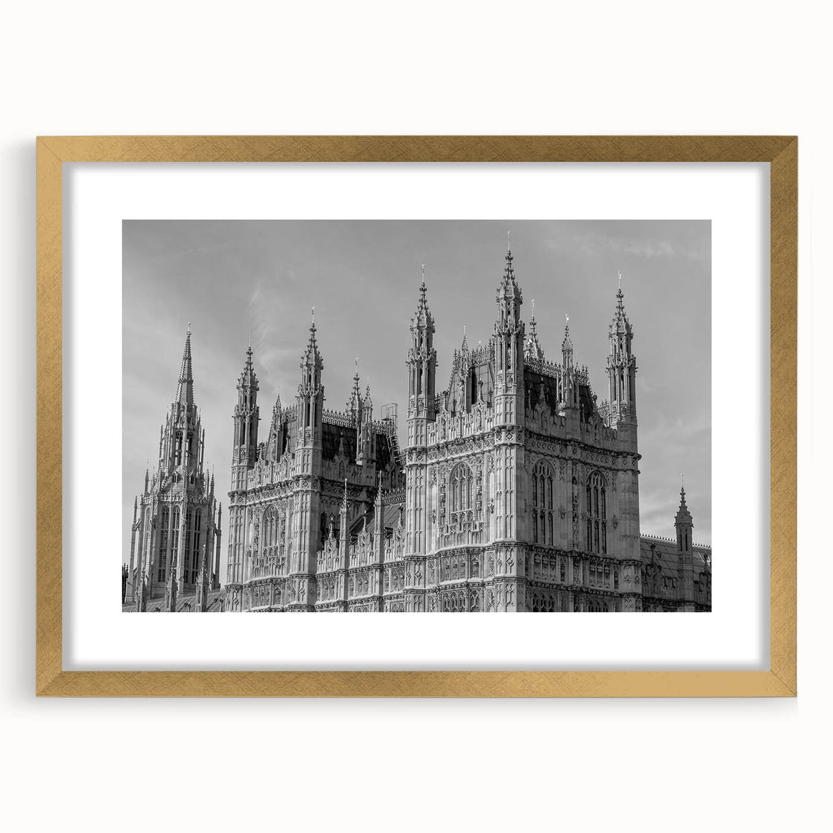 Abstract art print of London scenery in muted gold and blue tones on a framed canvas, ideal for dining room decor.