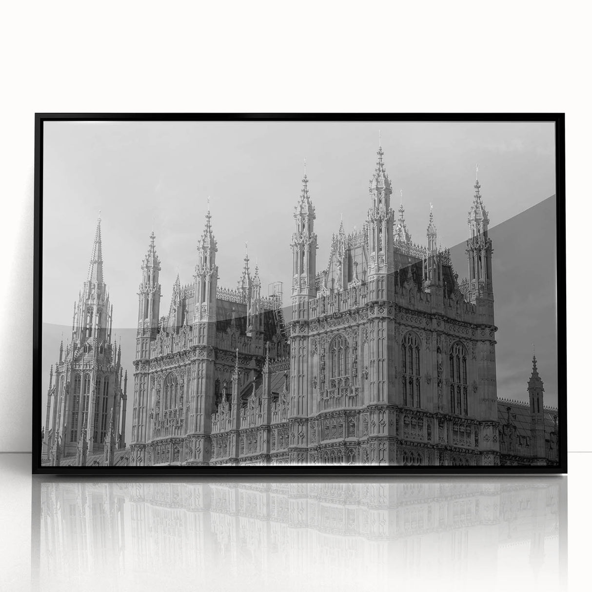 Large abstract wall art depicting the London skyline in black and white tones on a framed acrylic.