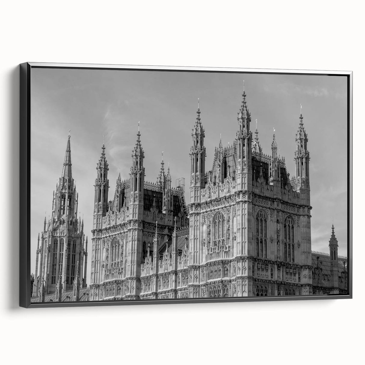 Black and white wall art of the London skyline on a framed canvas, ideal for bedroom decor.