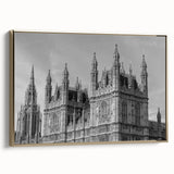 Framed canvas featuring a vintage-style London landscape in black and gold tones, ideal for bedroom wall art.