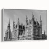 Vintage poster art of London scenery in vibrant colors on a large framed canvas, ideal for living room decor.