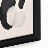 Close-up of abstract minimalist wall art featuring soft pastel colors and geometric shapes, elegantly framed to enhance modern decor aesthetics.