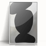 Framed abstract minimalist wall art featuring soft white tones and geometric shapes, displayed in an elegant acrylic frame, ideal for modern home decor.