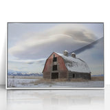 Framed acrylic wall art featuring a serene landscape scene with a barn, set against a clear sky and vibrant greenery, perfect for home decor enhancement.