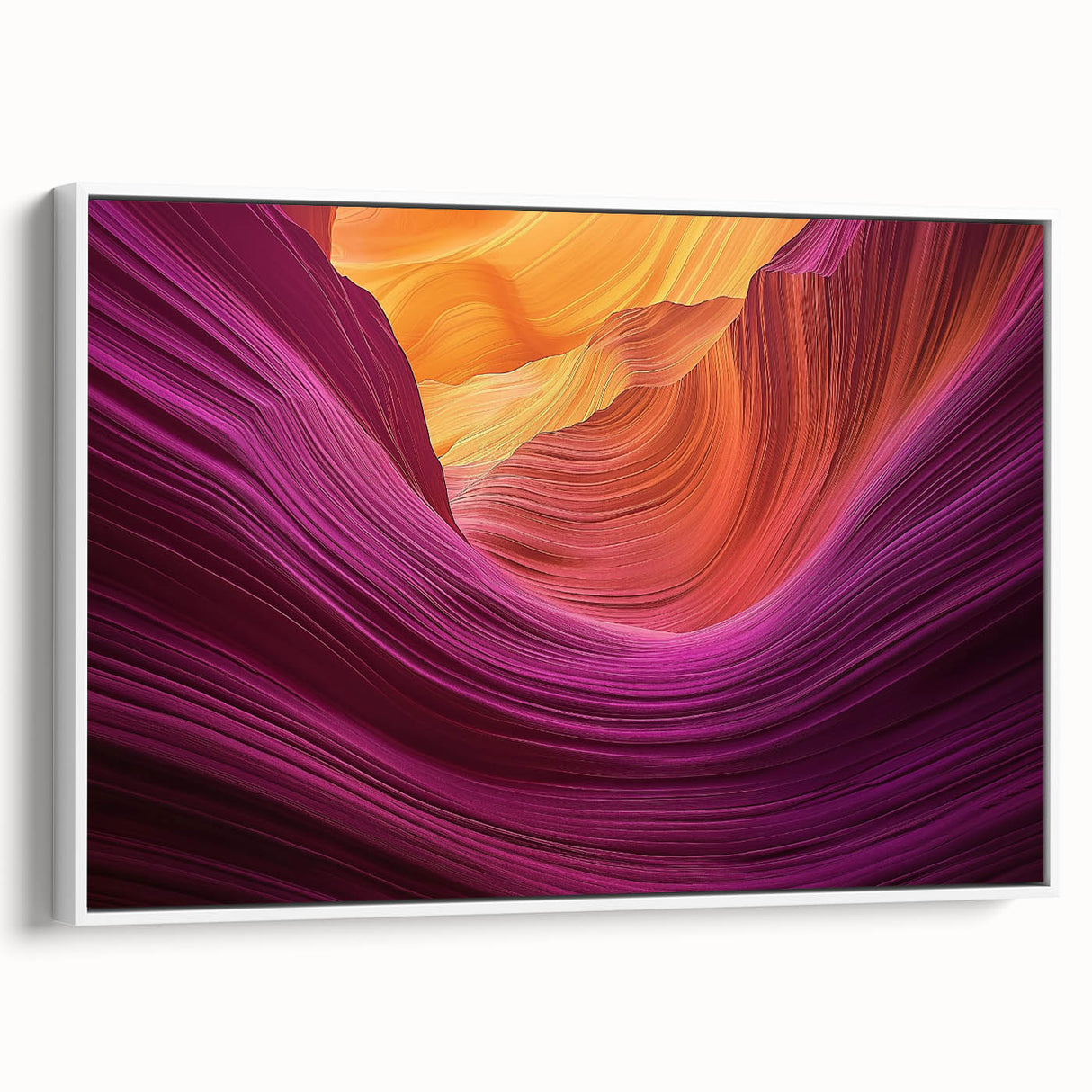 Framed canvas artwork depicting a stunning landscape of canyons in vibrant colors, showcasing a white frame and side view, ideal for home decor enhancement.