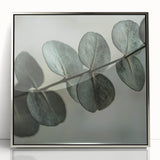 Mid-century modernist art depicting close-up leaves in silver tones on a framed acrylic, suitable for nursery wall decor.