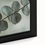 Close-up of textured leaves in black, framed canvas, ideal for living room decor.